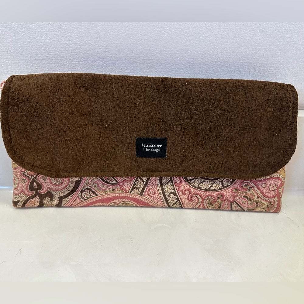 Madison Handbags pink and brown paisley clutch